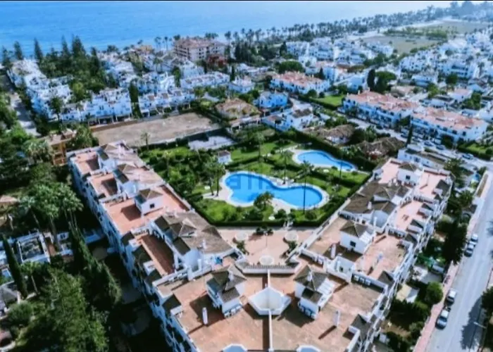 Апартаменты Junto Al Mar Piscinas Jardines Wifi *